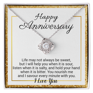 Love Knot anniversary necklace on a printed message card